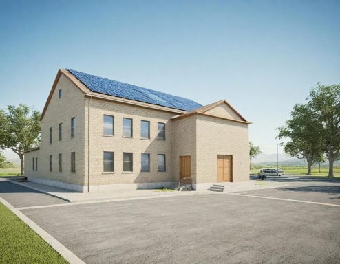Bâtiment moderne avec panneaux solaires, situé dans un environnement calme et verdoyant.